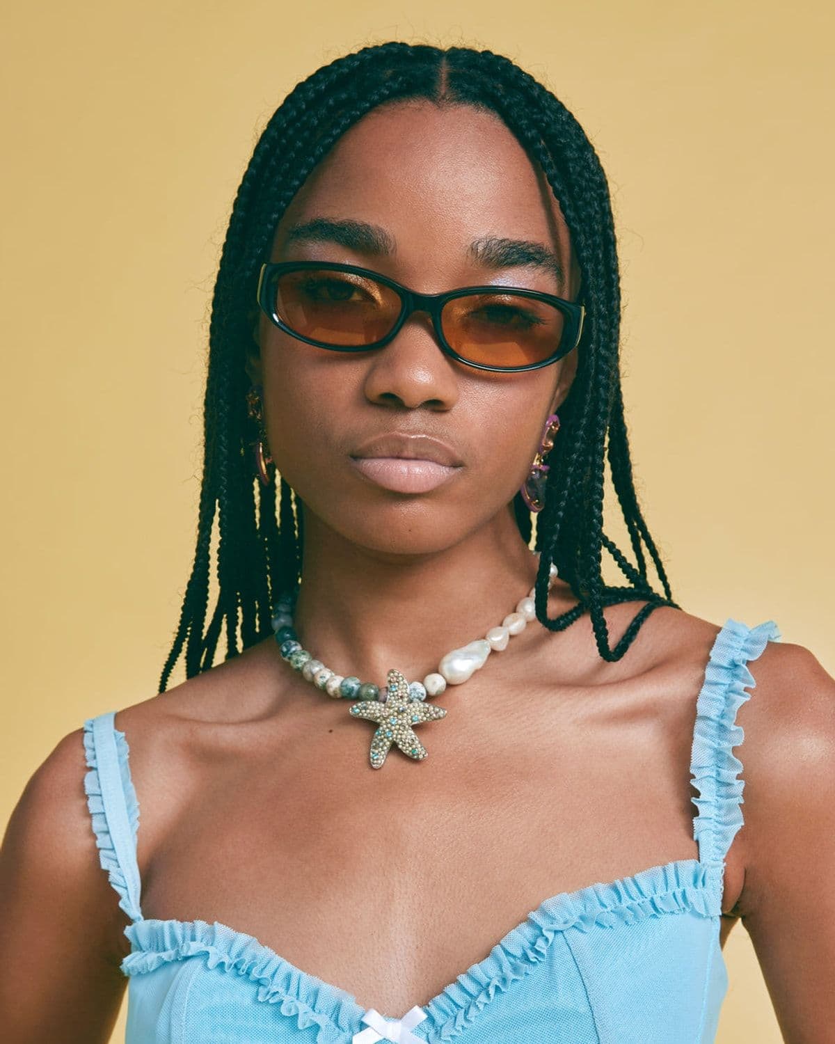 Kaz sunglasses in black/yellow, editorial shoot on model (filename credits model 'Shantae')